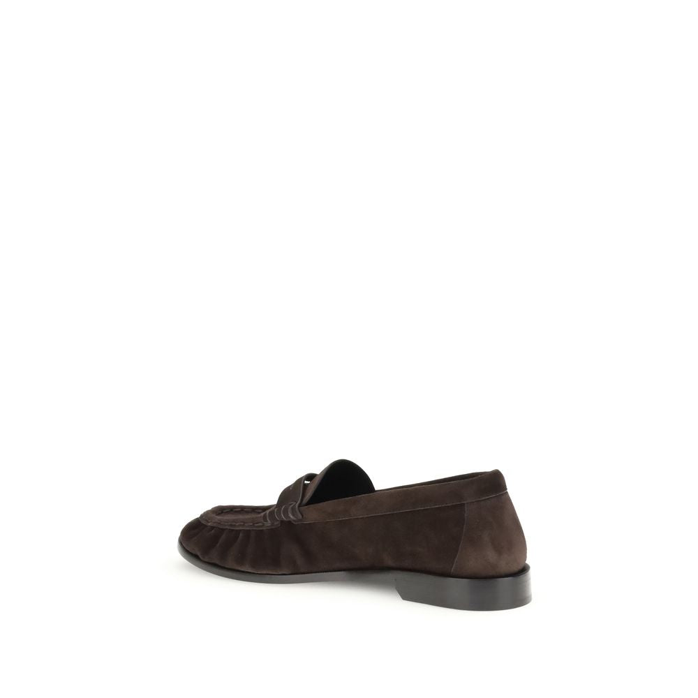 Saint Laurent Brown Calf Leather Bos Taurus Slip-On Loafers with gold Cassandre detail, moc toe, leather sole. Elegant AW25 design.
