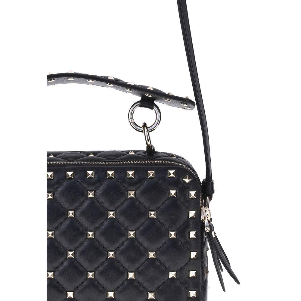 Front view with bag zipped and handles upright.