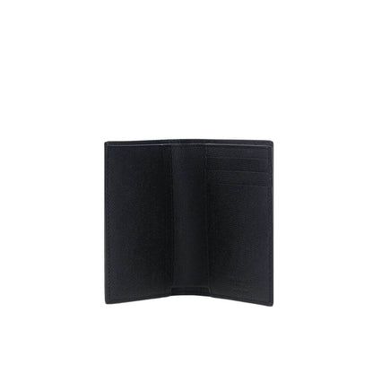 Saint Laurent Black Calf Leather Bos Taurus Wallet, billfold design, card slots, and iconic logo, made of grained leather.