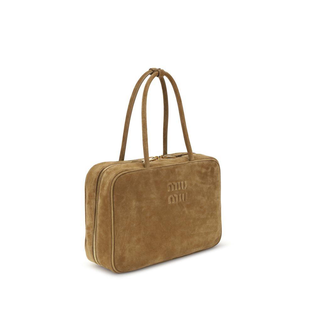 Front view with bag zipped and handles upright.