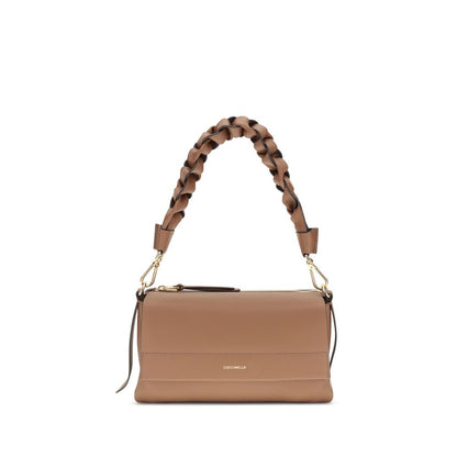 Coccinelle Beige Calf Leather Bos Taurus Shoulder Bag with woven handle and magnetic closure.