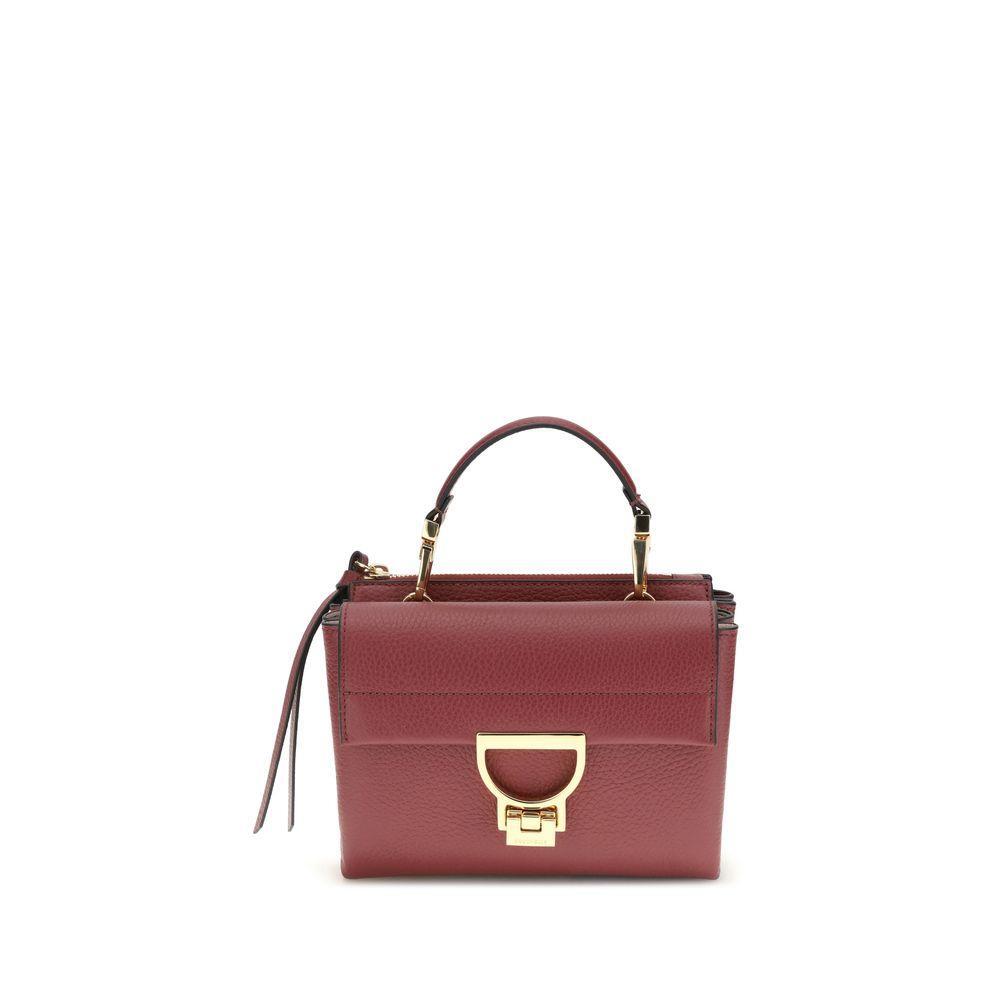 Front view with bag zipped and handles upright.