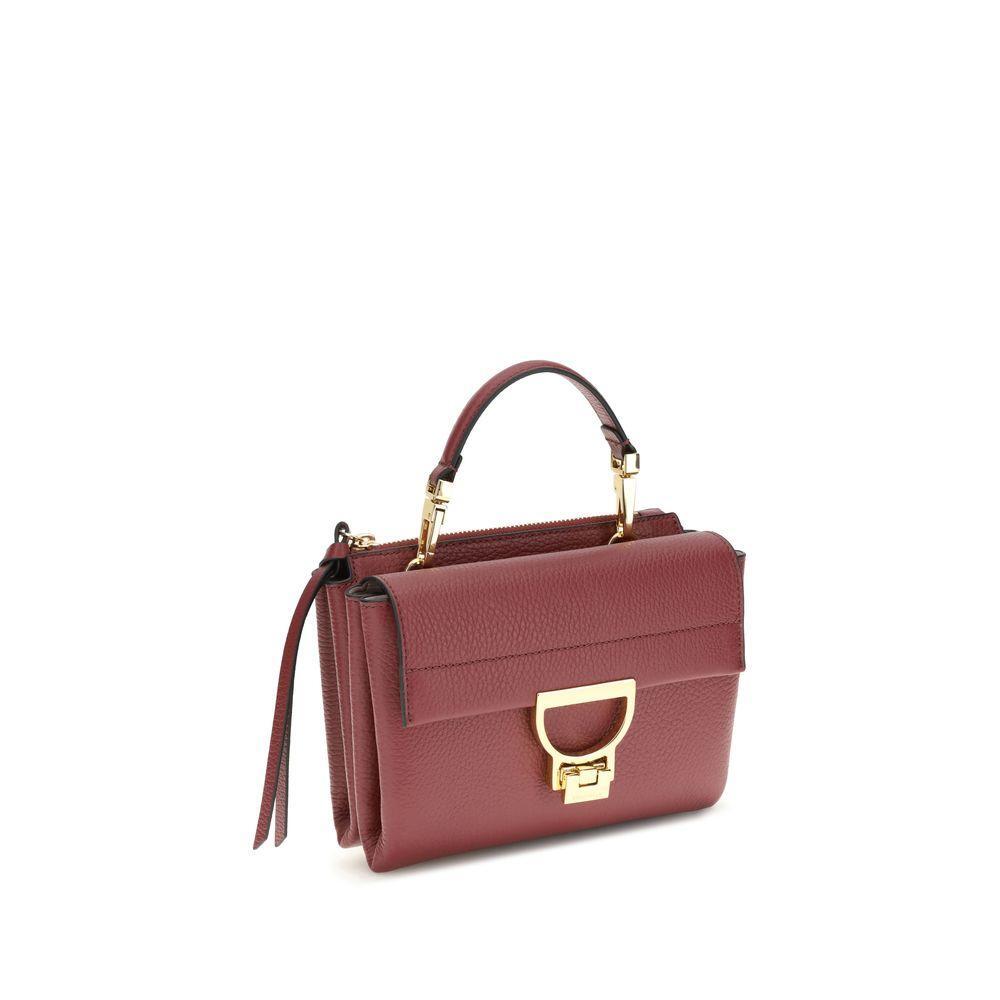 Front view with bag zipped and handles upright.