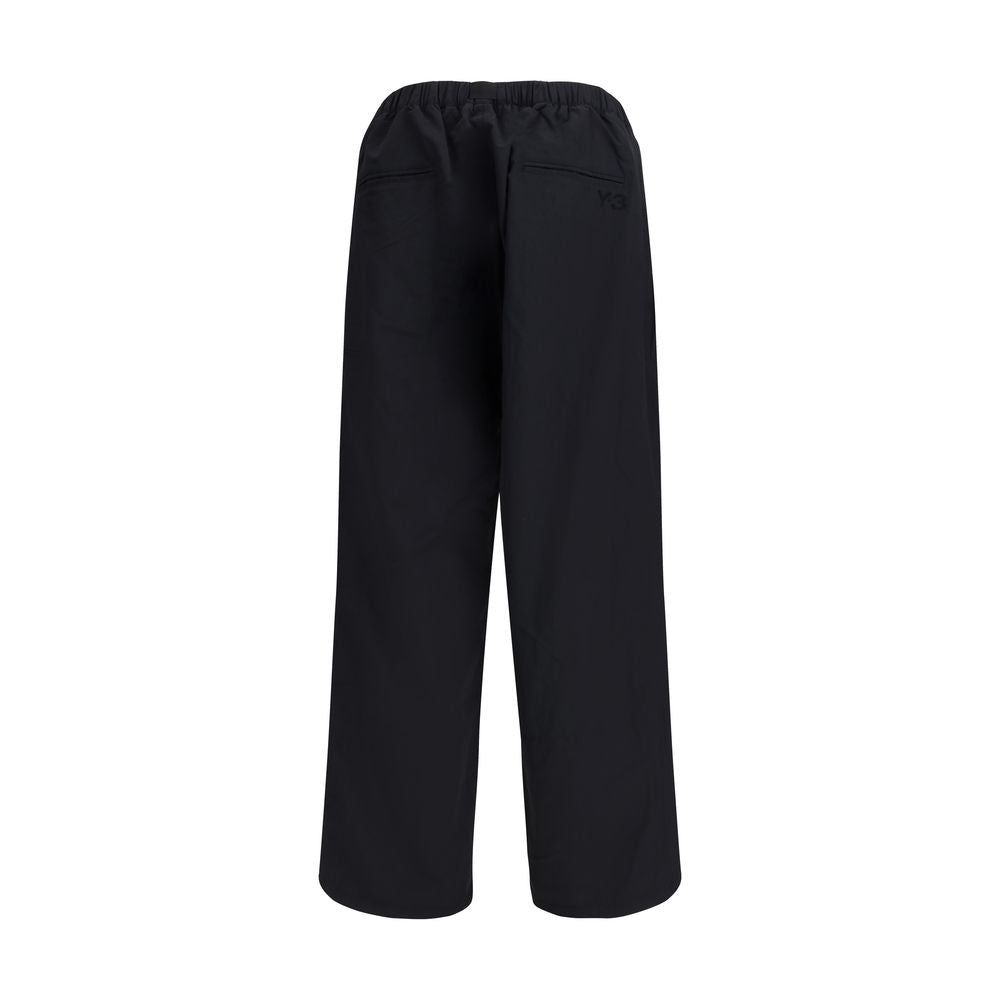 Y-3 Black Nylon Casual Pants, elasticized waistband, front pockets, Y-3 logo, AW25 season, regular fit, 100% nylon composition.