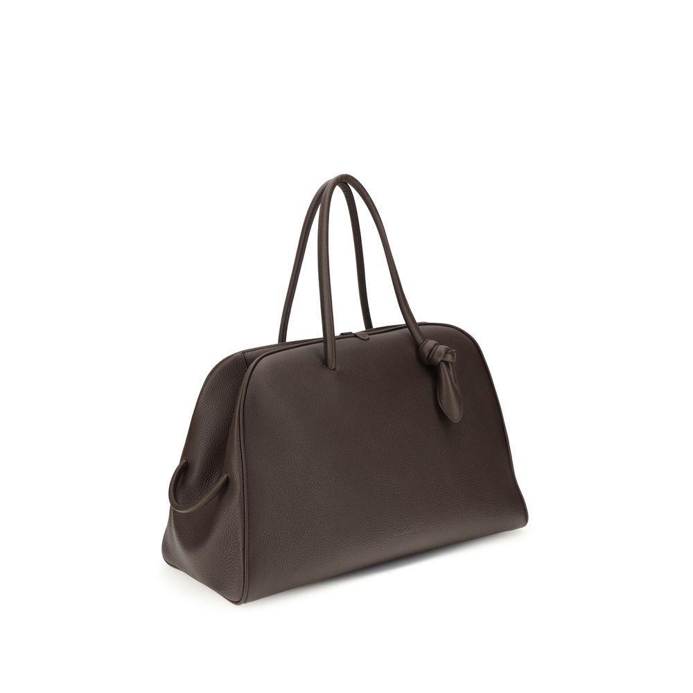 Front view with bag zipped and handles upright.