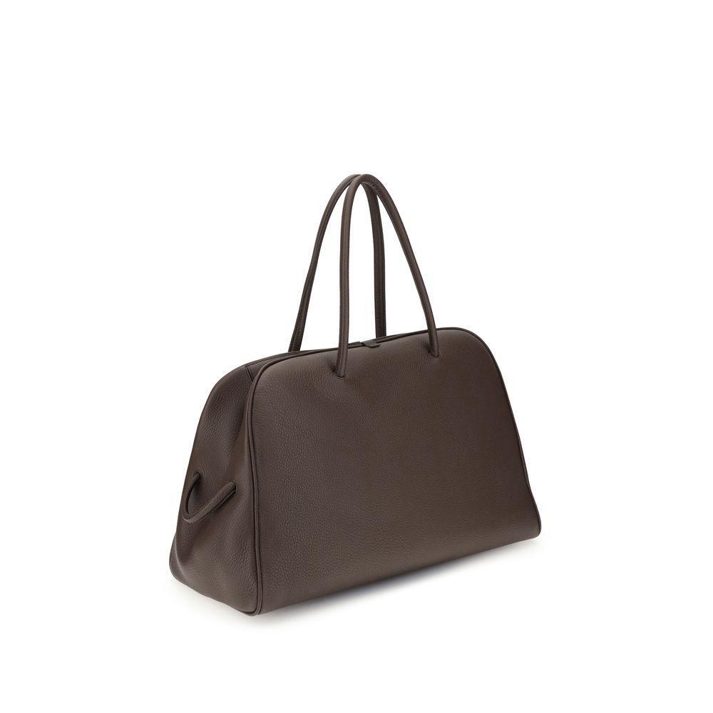 Front view with bag zipped and handles upright.