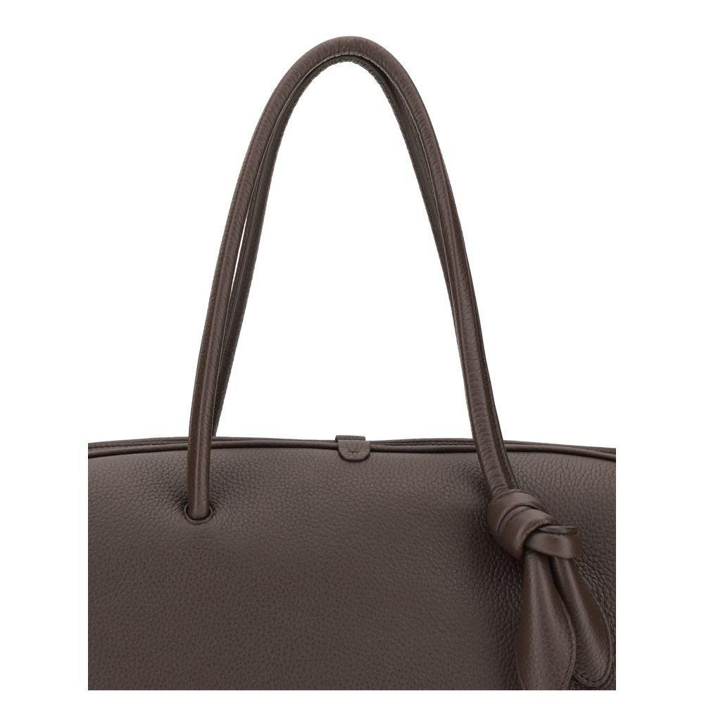 Front view with bag zipped and handles upright.
