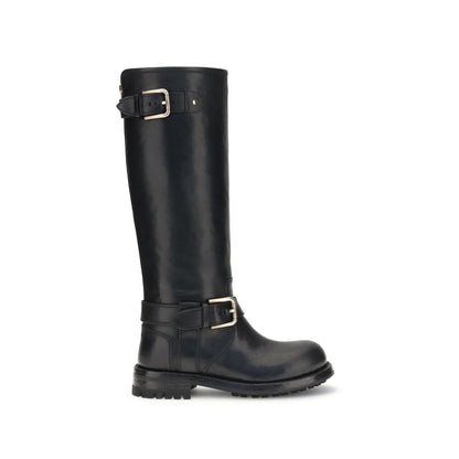 Dolce & Gabbana Black Calf Leather Bos Taurus Lace-Up Boots with gold buckle detailing for a stylish look.