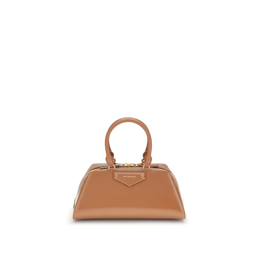 Givenchy Brown Calf Leather Bos Taurus Handbag with structured design and articulated handles, featuring embossed signature.