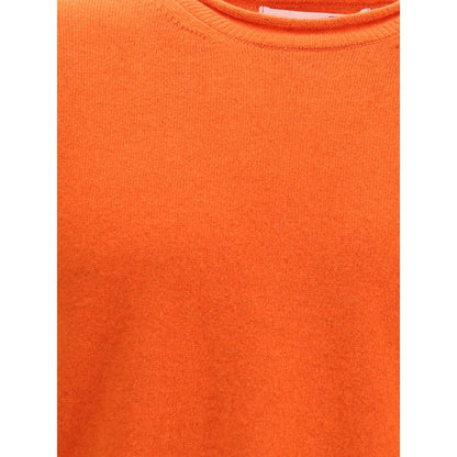 Comme Des Garçons Orange Wool Sweatshirt, ribbed knit, round neckline, long sleeves, Autumn-Winter fashion, sophisticated elegance.