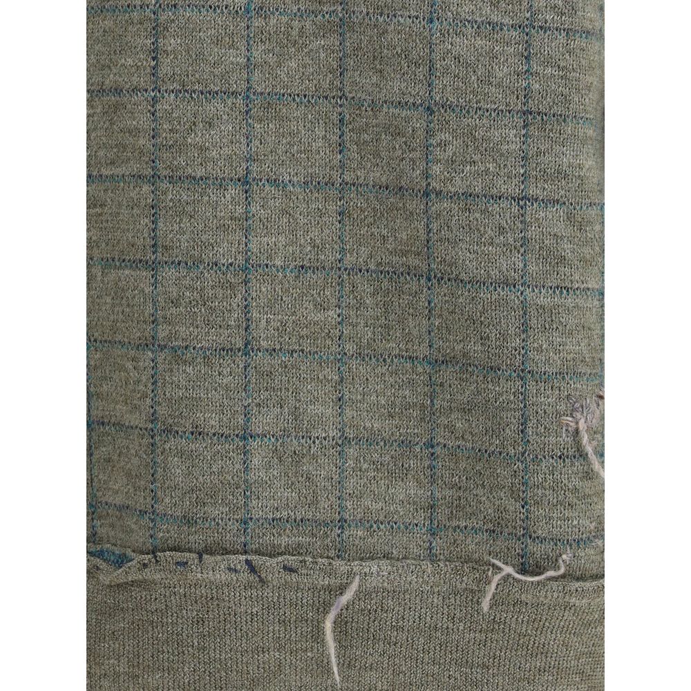 Close-up of grid pattern on Margiela Green Fleece Wool Sweatshirt, featuring detailed texture and design. Ideal for winter fashion.