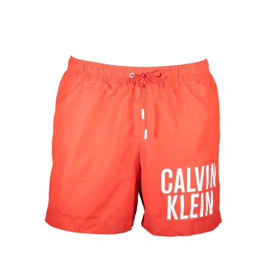 Calvin Klein Red Polyester Swimwear with elastic waist, two front pockets, one back pocket, logo print, made from 100% recycled materials.