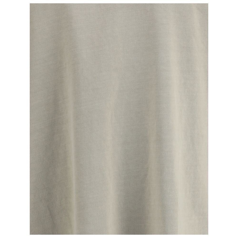 Close-up of beige fabric showcasing Agolde Beige Cotton Sportswear material; soft jersey with ribbed texture.