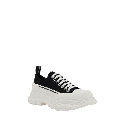 Alexander McQueen Black Rubber Chunky Sneakers with reinforced round toe and contrasting platform sole.