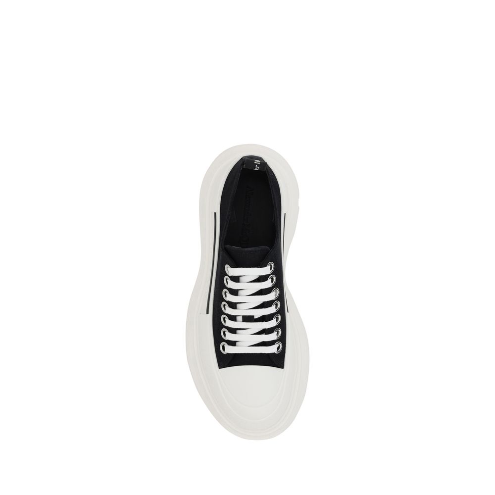 Top view of Alexander McQueen Black Rubber Chunky Sneakers, featuring a modern design with white lace-up closure and contrasting platform sole.