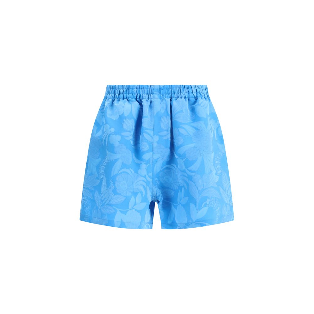 Balenciaga Blue Viscose Bermuda Shorts with floral pattern, elasticized waistband, two side welt pockets, perfect for a bold summer look.