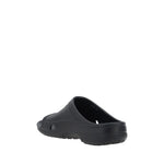 Back view of Balenciaga Eva Sandals showcasing unique rubber design and embossed logo on front strap, SS25 Collection.