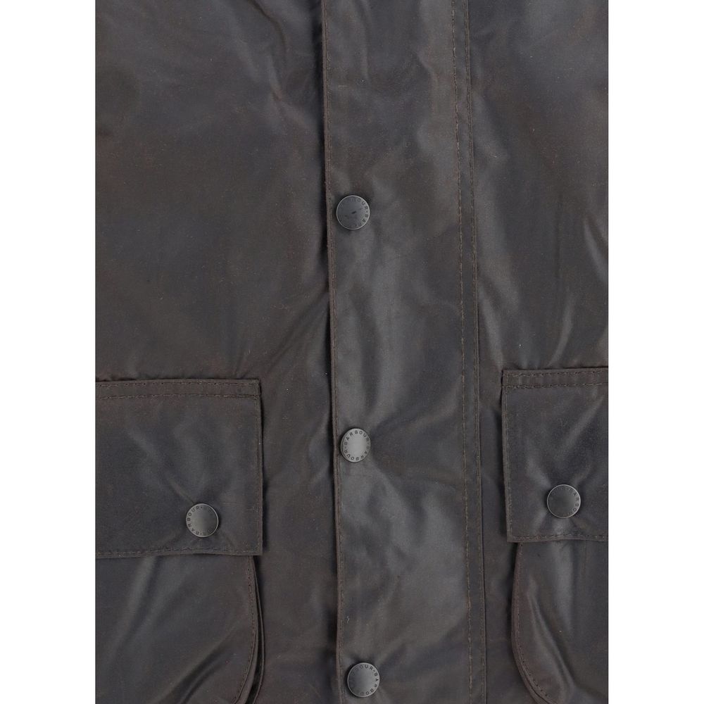 Close-up of Barbour Black Cotton Coat showing buttons and pockets.
