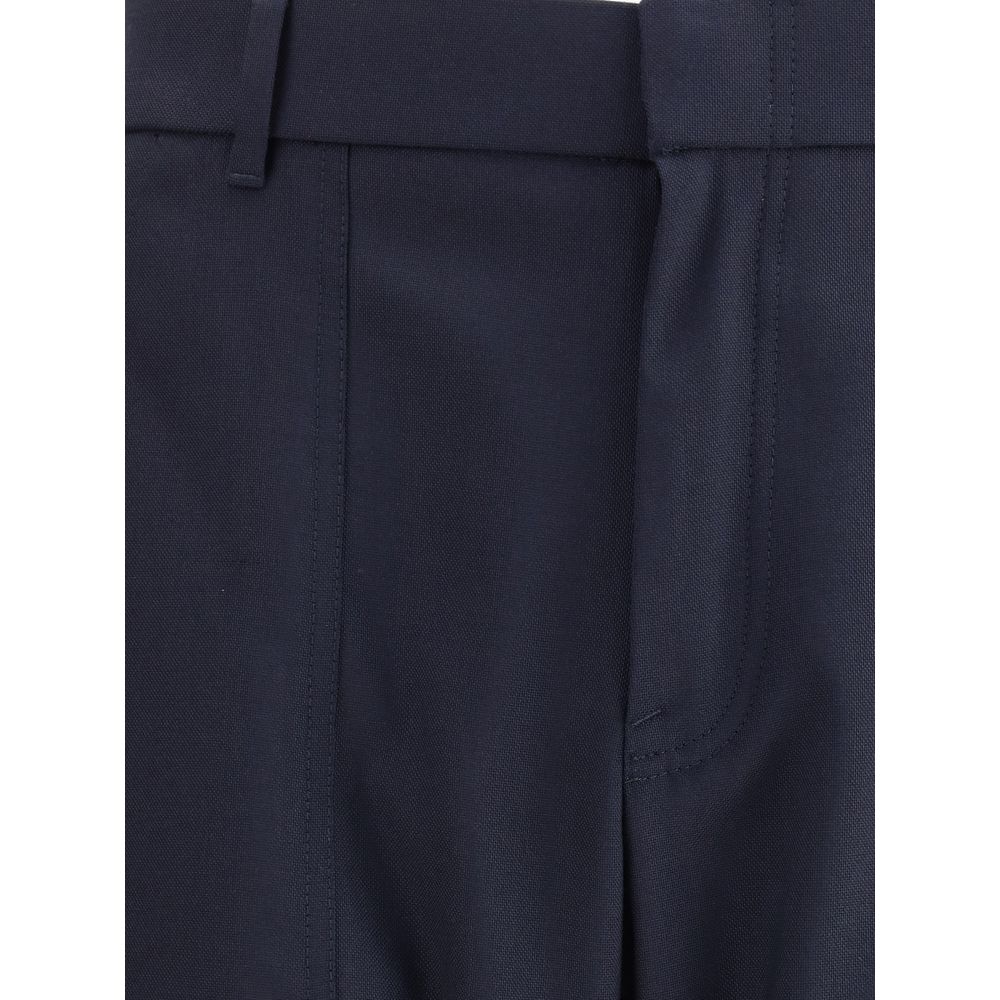 Brioni Blue Wool Casual Pants with zipper and hook front closure, elastic hem, and belt loops showcasing refined style and comfort.