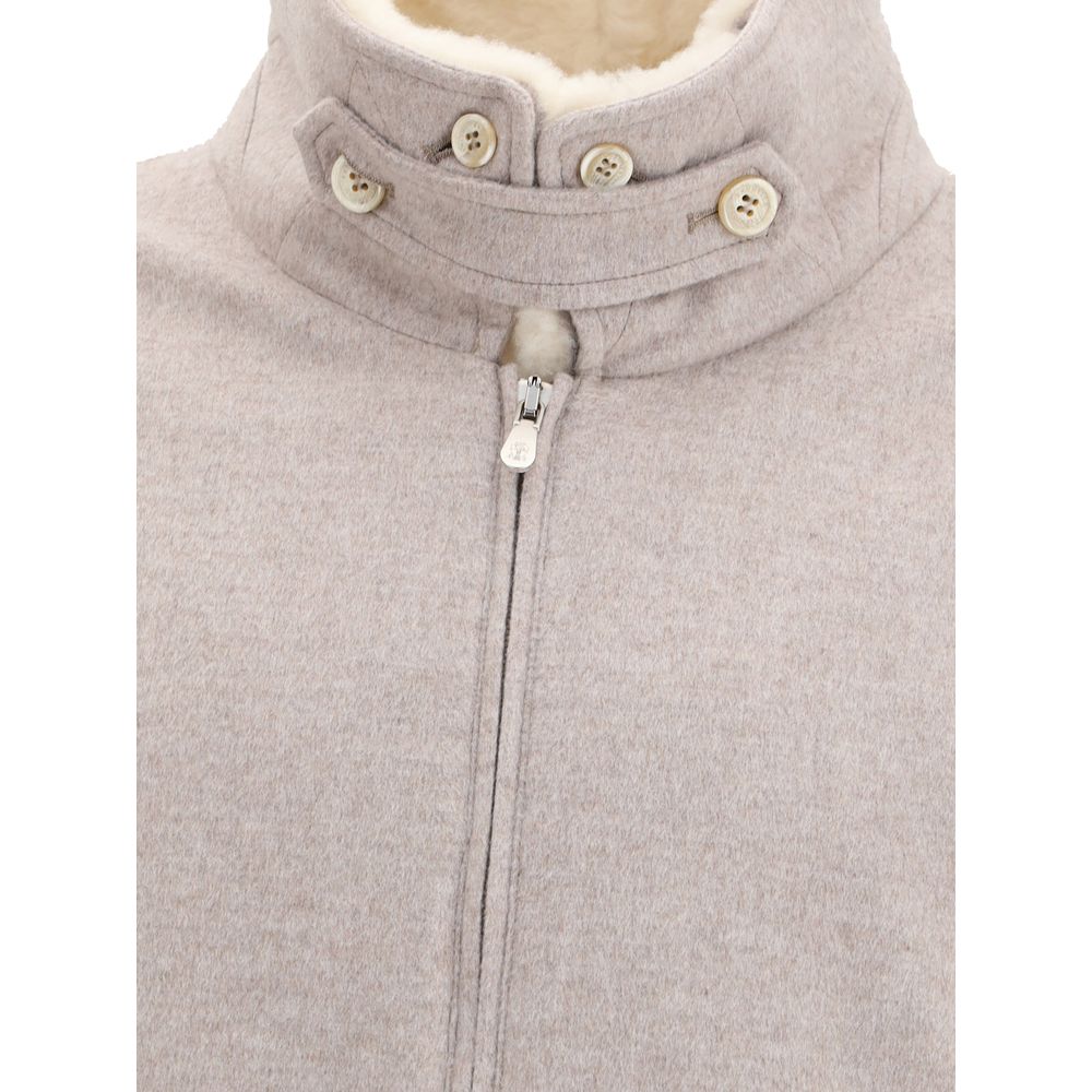 Detailed view of Brunello Cucinelli Beige Cashmere Bomber with shearling insert, showcasing premium fabric and buttoned design.