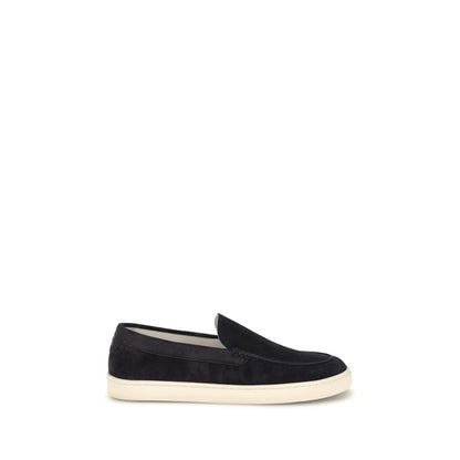 Brunello Cucinelli Black Calf Leather Bos Taurus Sneakers, elegant slip-on design, logo-embossed insole, flat rubber sole for comfort.
