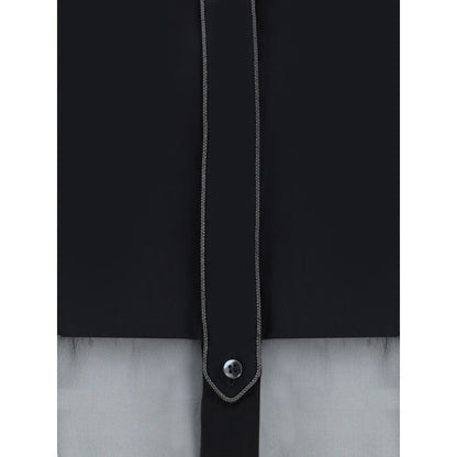 Close-up of Brunello Cucinelli Black Cotton Pattern Shirt showcasing semi-transparent design and button detail.