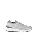 Brunello Cucinelli Techno cotton knit runners in light grey with flat sole, rubber heel insert, textured sole, and cotton knit upper.