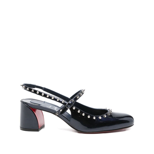 Christian Louboutin Janispikes pumps in dark blue patent leather with studded embellishments, slingback strap, and 6 cm block heel.