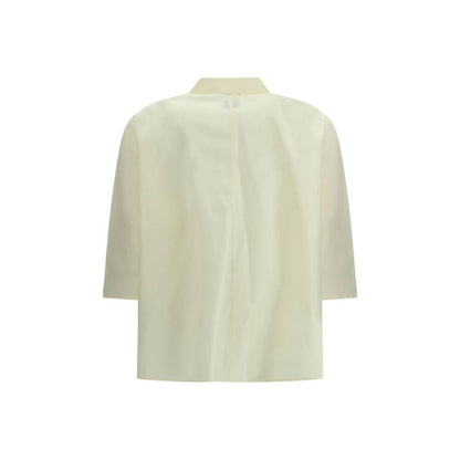 Cruna Yellow Cotton Blouse with classic collar and 3/4 sleeves, perfect for a refined and versatile look, back view.