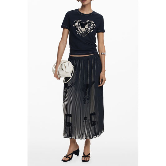 Woman wearing Desigual Black Polyester Women Skirt with newspaper motifs and elastic waist.