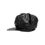Dolce & Gabbana Black Calf Newsboy Capello Cabbie Hat in leather with minor scratches, showcasing high craftsmanship and exclusive design.