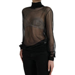 Dolce & Gabbana Black Mesh Turtleneck Sheer Blouse Top with long sleeves photographed on model, showing pulled threads. Made in Italy.