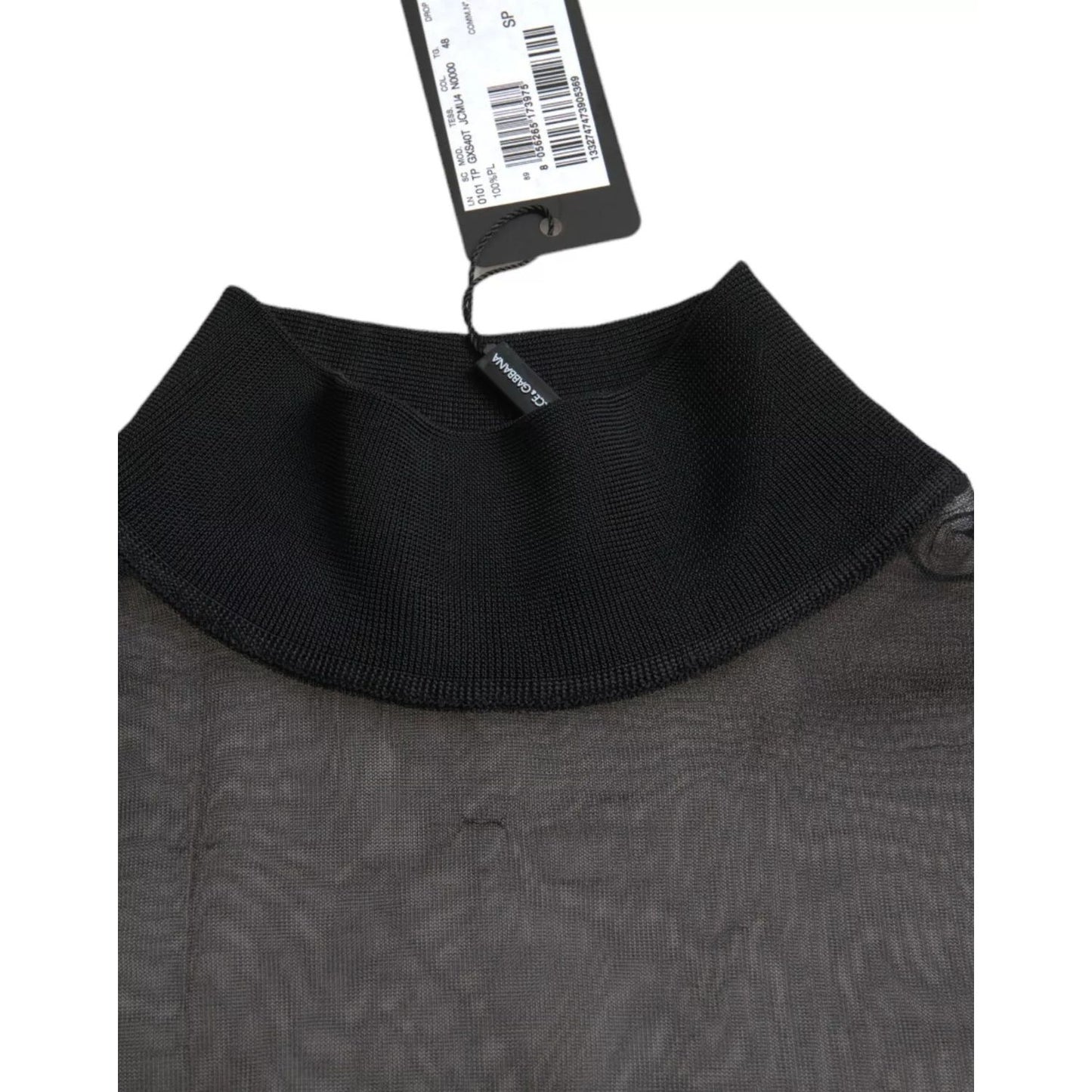Dolce & Gabbana Black Mesh Turtleneck Sheer Blouse Top with tag, showcasing polyester material and logo details, includes minor defects.