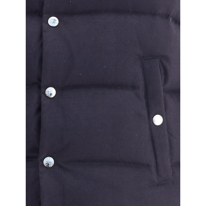 Close-up of Dolce & Gabbana Blue Cotton Jackets And Coat showing snap button closure and buttoned welt pocket detail.