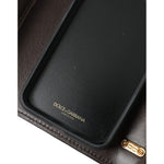 Inside view of Dolce & Gabbana Brown Python Leather DG Girls Crossbody Phone Bag showing leather lining and brand logo.