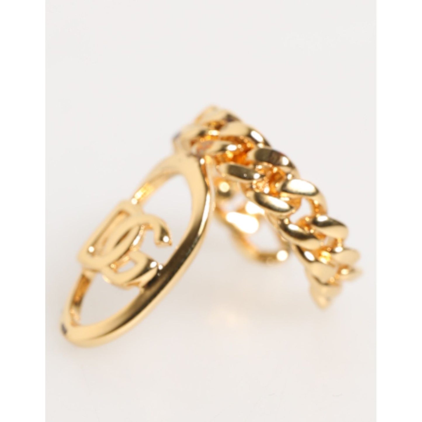 Dolce & Gabbana Gold Tone Brass Oval DG Logo Chain Adjustable Ring with curb chain style and iconic logo detail.