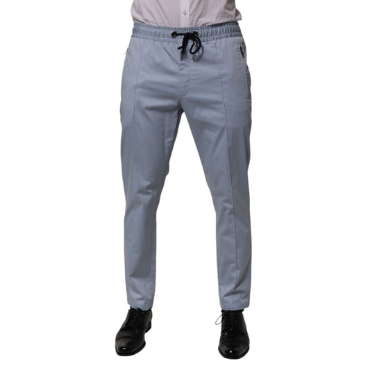 Dolce & Gabbana Light Blue Cotton Drawstring Elastic Waist Men Pants, jogger style with slim fit and logo details.