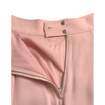 Close-up of Dolce & Gabbana Light Powder Rose Viscose Pleated Skirt with side zip and snap closure, highlighting luxurious fabric.