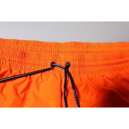 Close-up of Dolce & Gabbana Orange Polyester Beachwear Shorts 2Pc Swimwear with drawstring waistband and elasticated detail.
