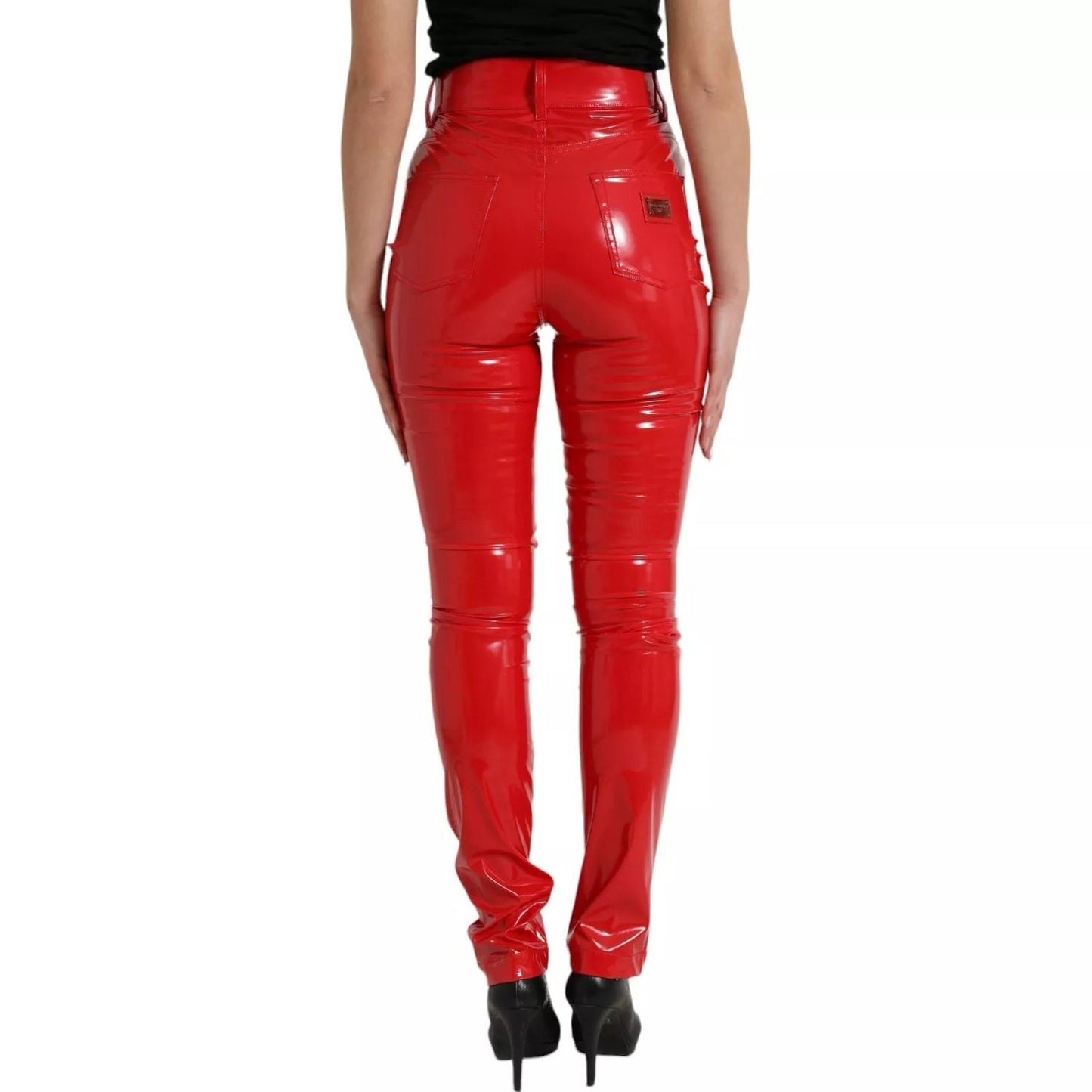 Back view of Dolce & Gabbana Red High Waist Skinny Trouser Shiny Pants with zipper closure, logo detail, and high comfort fit.