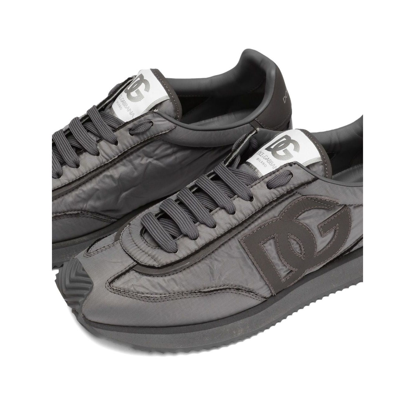 Dolce & Gabbana Sneakers Grey featuring embroidered logo, lace-up fastening, flat rubber sole, and padded collar for style and comfort.