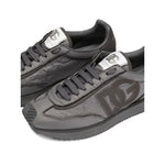 Dolce & Gabbana Sneakers Grey featuring embroidered logo, lace-up fastening, flat rubber sole, and padded collar for style and comfort.