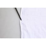 Close-up of Dolce & Gabbana White Cotton MARTINI Men Formal Dress Shirt showing fabric texture and detailing.