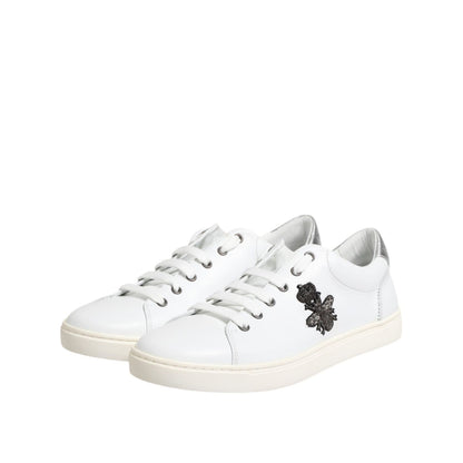 Dolce & Gabbana White Crown Bee Leather Low Top Sneakers Shoes displayed at an angle, featuring high craftsmanship and logo details.