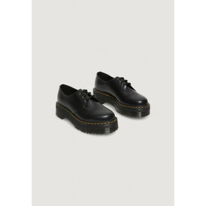 Dr. Martens Black Leather Lace-Up Boots, thick sole women’s shoes, durable and stylish for any occasion.
