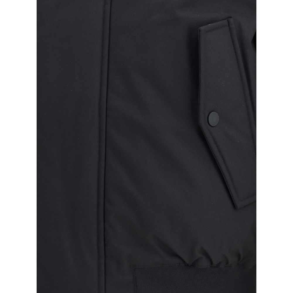 Close-up of Dsquared² Black Polyester Bomber showcasing pocket detail, ribbed elastic hem, and padded texture.