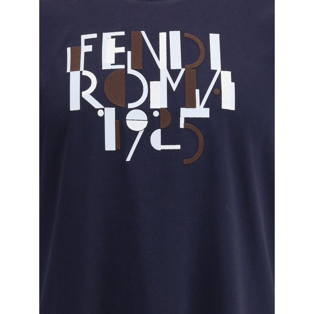 Fendi Blue Cotton T-Shirt with iconic logo print, ribbed crew neck, perfect for a casual look. AW25 Regular Fit, 100% Cotton.