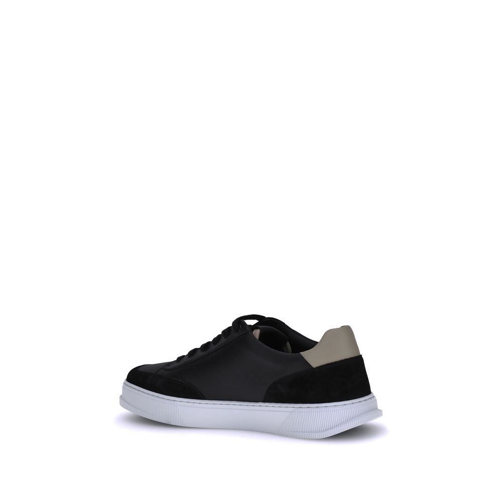 Ferragamo Gancini Sneakers with leather upper and iconic Gancini detail, designed for comfort and versatility in casual elegance.