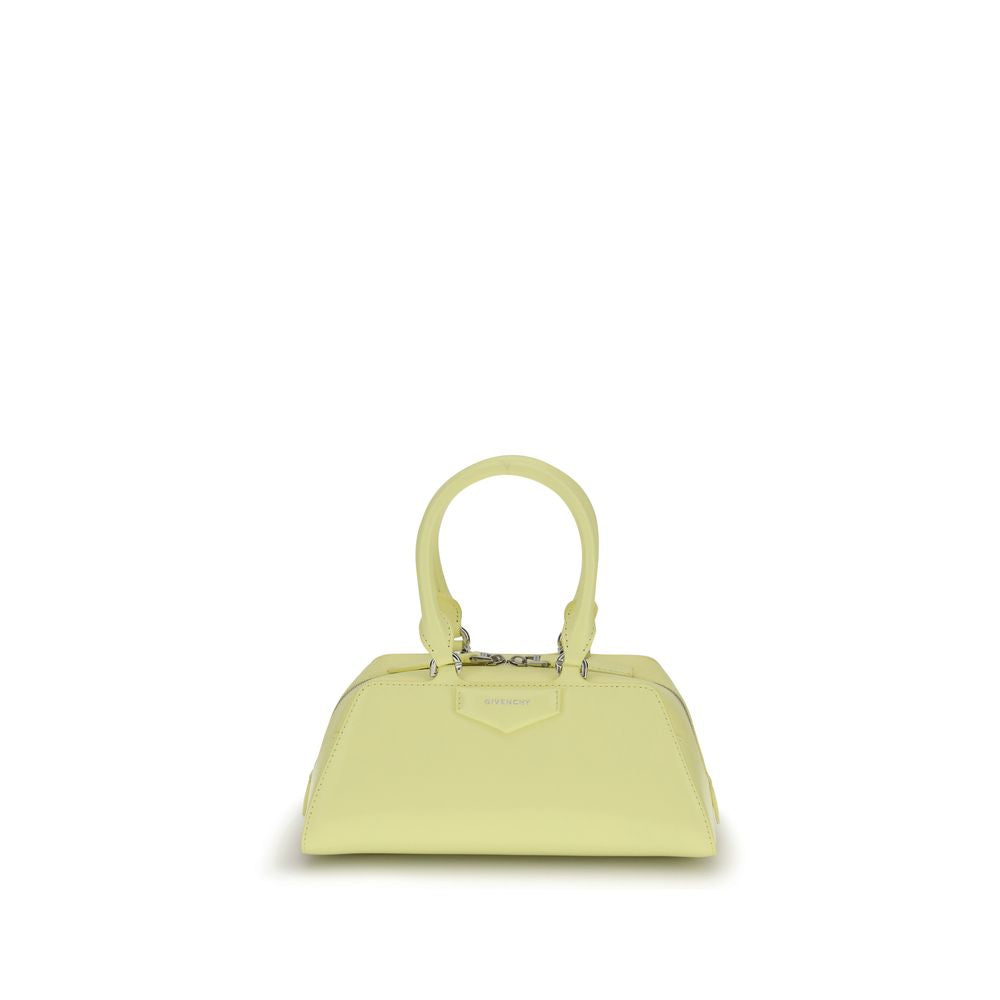 Givenchy Yellow Calf Leather Bos Taurus Handbag with articulated handles and embossed logo, featuring refined origami-inspired design.