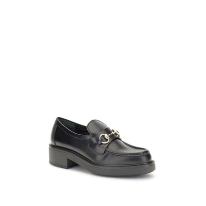 Gucci Black Calf Leather Bos Taurus Slip-On Loafers with iconic metal horsebit detail, round toe, and block heel for formal and everyday wear.